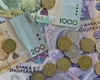 Vacanțele de vară schimbă piața valutară. Ce monede cumpără cel mai des românii înainte de concediu și greșeala care îi poate costa bani