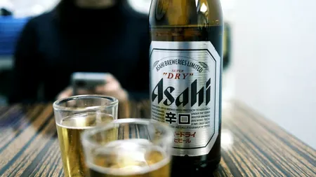 Gigantul berii Asahi, forțat de hackeri să se întoarcă la pix și hârtie