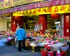 Pericol de deflație în China: prețurile de consum au scăzut a treia lună la rând
