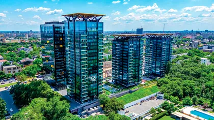 One United Properties atinge un minim istoric al acțiunilor: Pierderi financiare și riscuri pe piața imobiliară în 2025