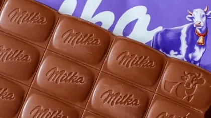 Ciocolata Milka ajunge în fața instanței. Acuzații de ambalaje înșelătoare și prețuri umflate