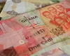 Aurul propulsează moneda națională a Ghanei în topul valutelor