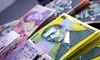 Românii preferă cash-ul. BNR semnalează o creștere cu 14,2% a numerarului aflat în circulație în afara băncilor în 2024