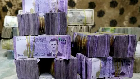 Siria plănuiește să tipărească o bancnotă nouă în Emiratele Arabe Unite și Germania. Rusia, scoasă din joc