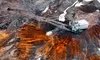 Apă otrăvită, lacuri radioactive și dealuri mutilate: prețul pământurilor rare din China